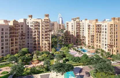 Abstract wavy lines gradient in yellow and orange on a soft blue-gray background.